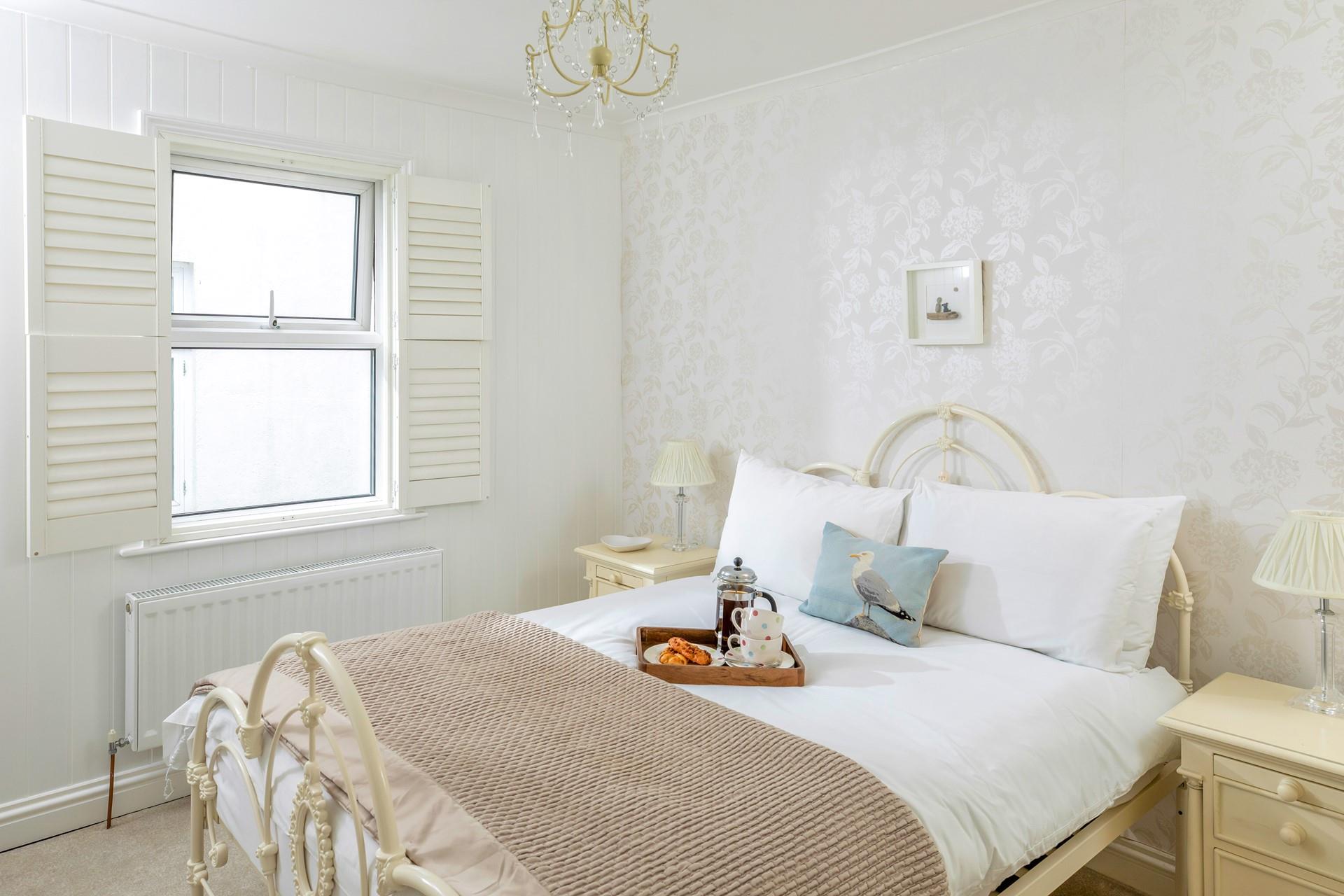 Sip coffee in bed and decide on the day's plans.