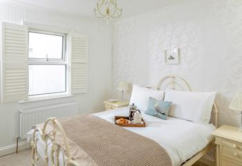Sip coffee in bed and decide on the day's plans.