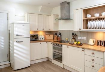 The kitchen is modern and well equipped.