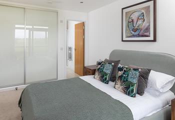 Bedroom 1 boasts built in storage and an en suite.