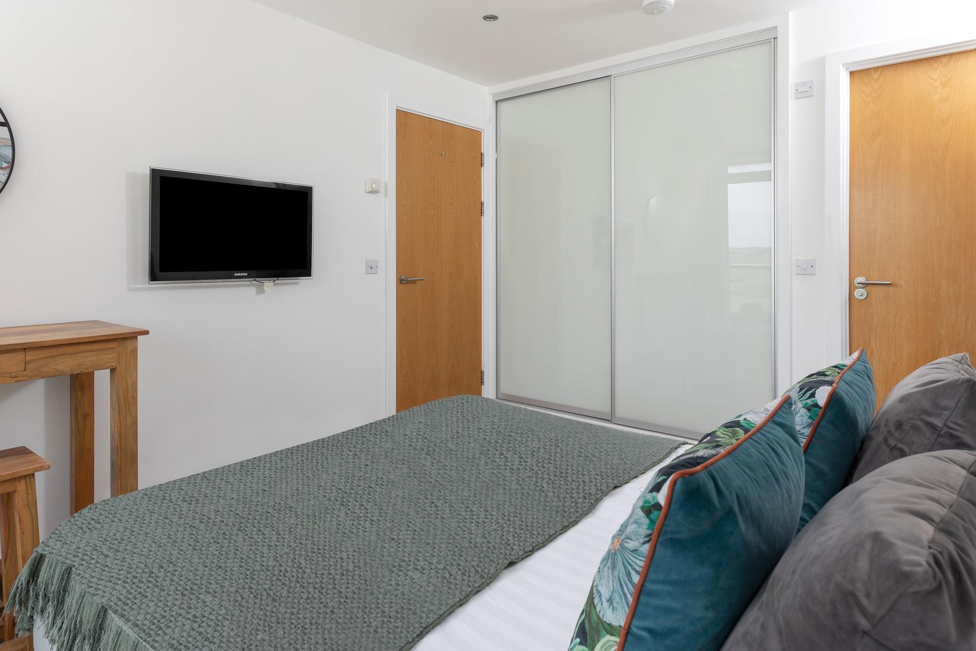 Spend slow mornings in bed before heading out to the beach!