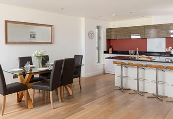 Spend time together around the dining table, playing games or tucking into family feasts.