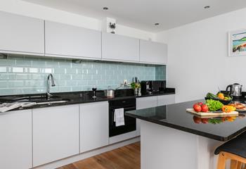 Cook up a storm in the well-equipped kitchen!