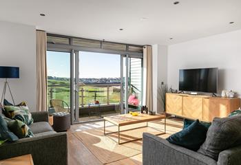 The spacious living area is light and bright.