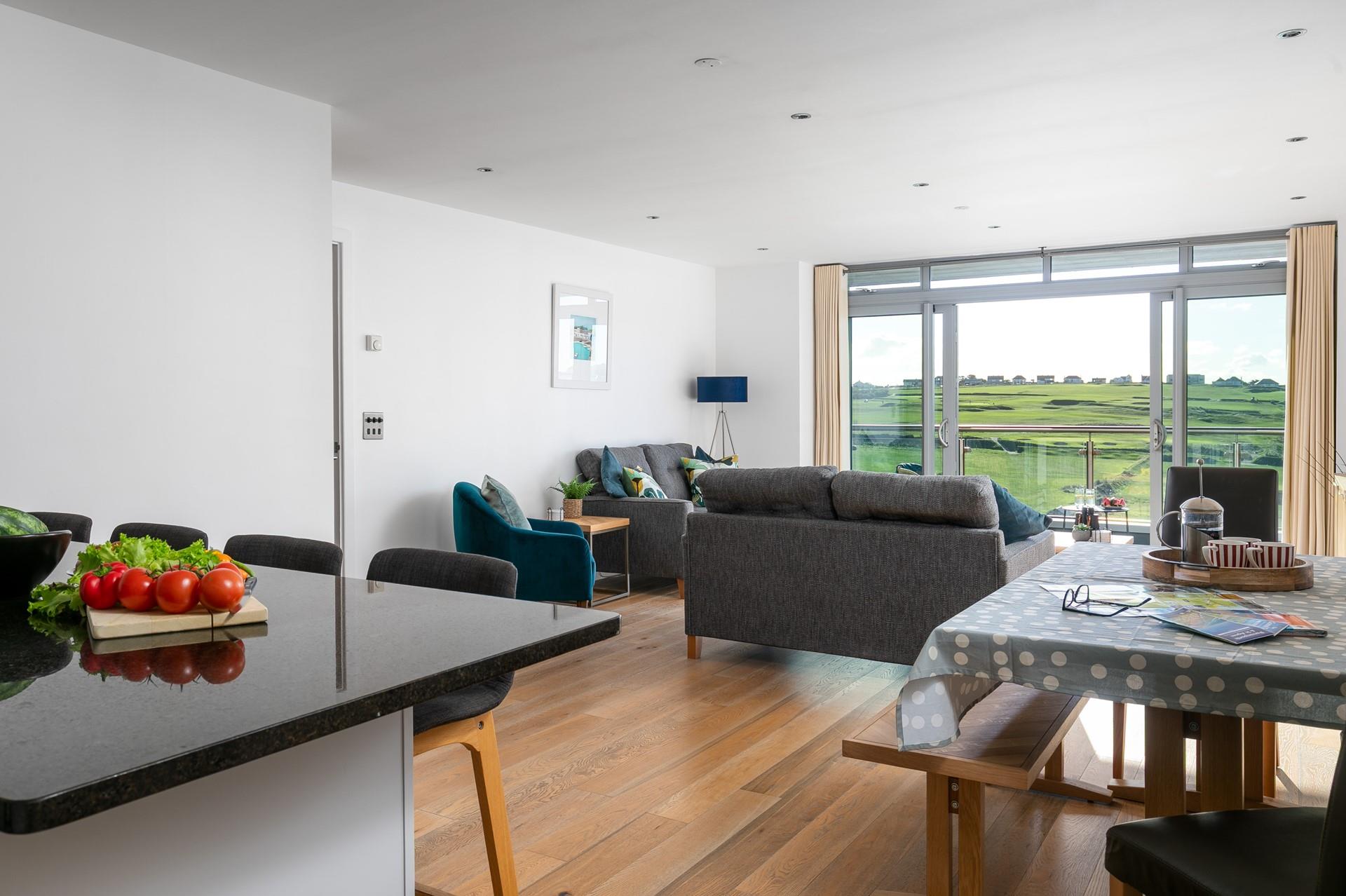 Open the patio doors and let the summer breeze drift through the apartment.