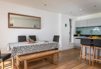 Spend time together around the dining table, playing games or tucking into family feasts.