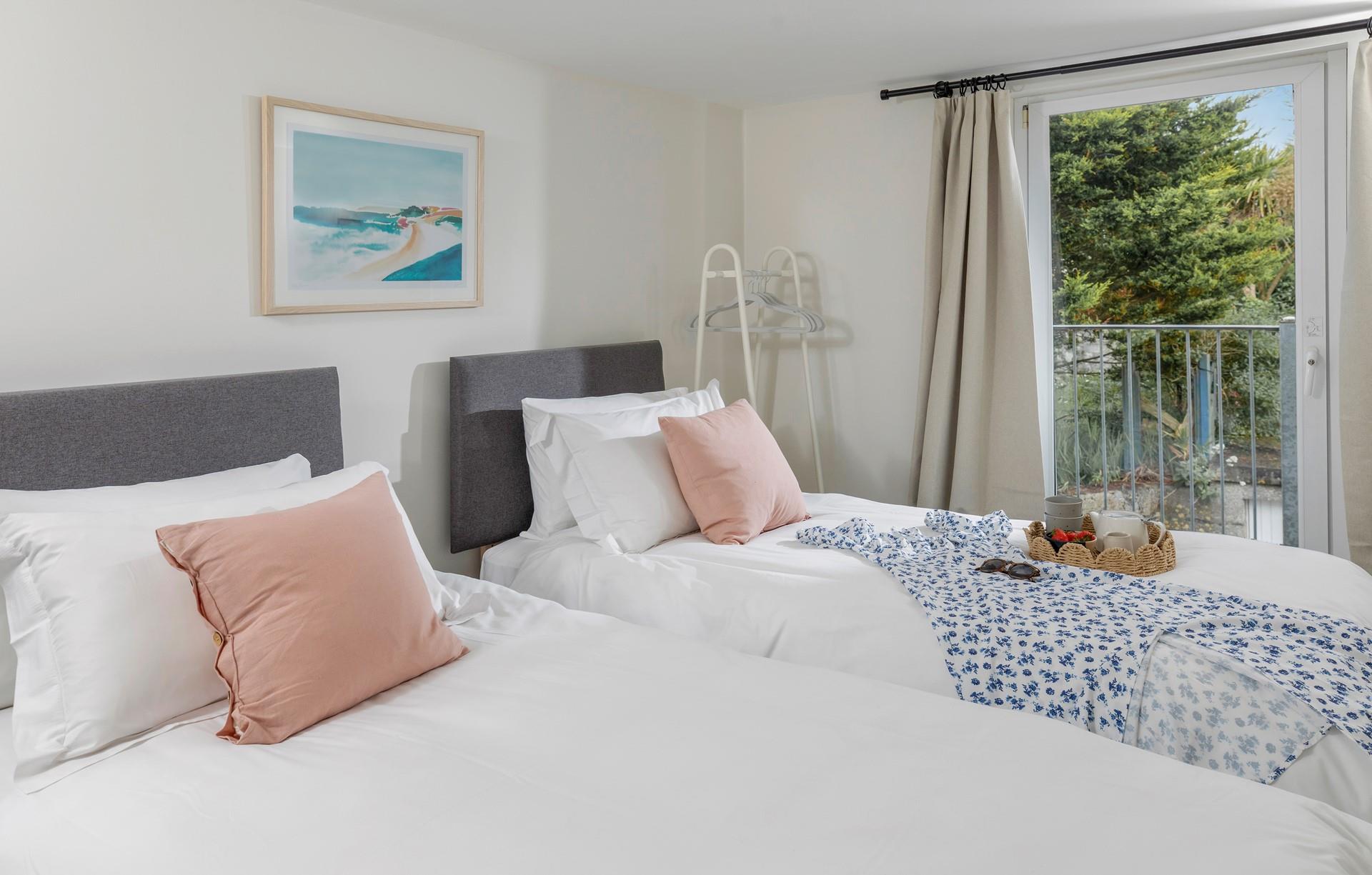 Twin beds allow for flexible sleeping arrangements.