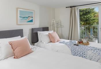 Twin beds allow for flexible sleeping arrangements.