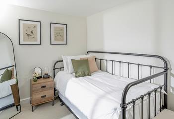 The day bed with trundle is ideal for additional guests.