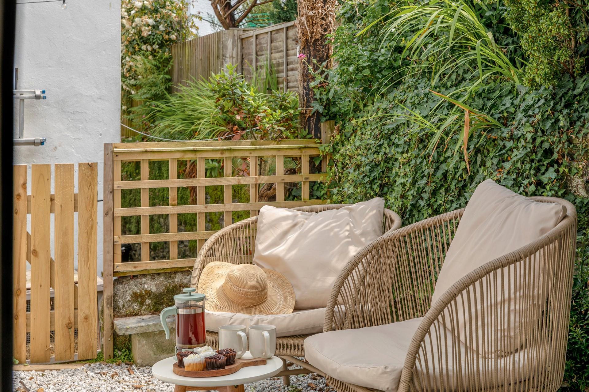 Indulge in tea and cake in the afternoon sun.