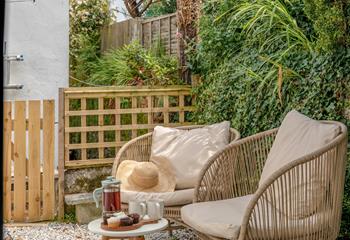Indulge in tea and cake in the afternoon sun.