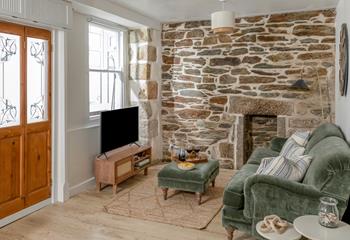 Traditional, charming features such as the exposed stone wall add to the character.