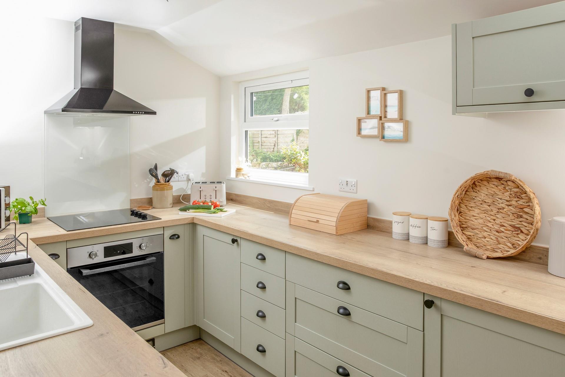 The kitchen is modern and well-equipped for rustling up meals.