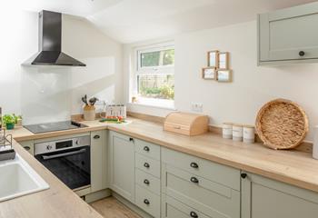 The kitchen is modern and well-equipped for rustling up meals.