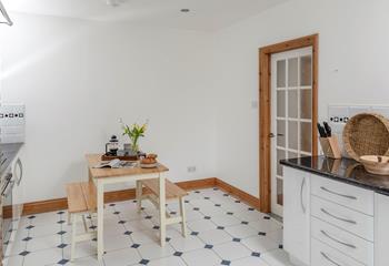 The kitchen is fully equipped for cooking tasty meals.