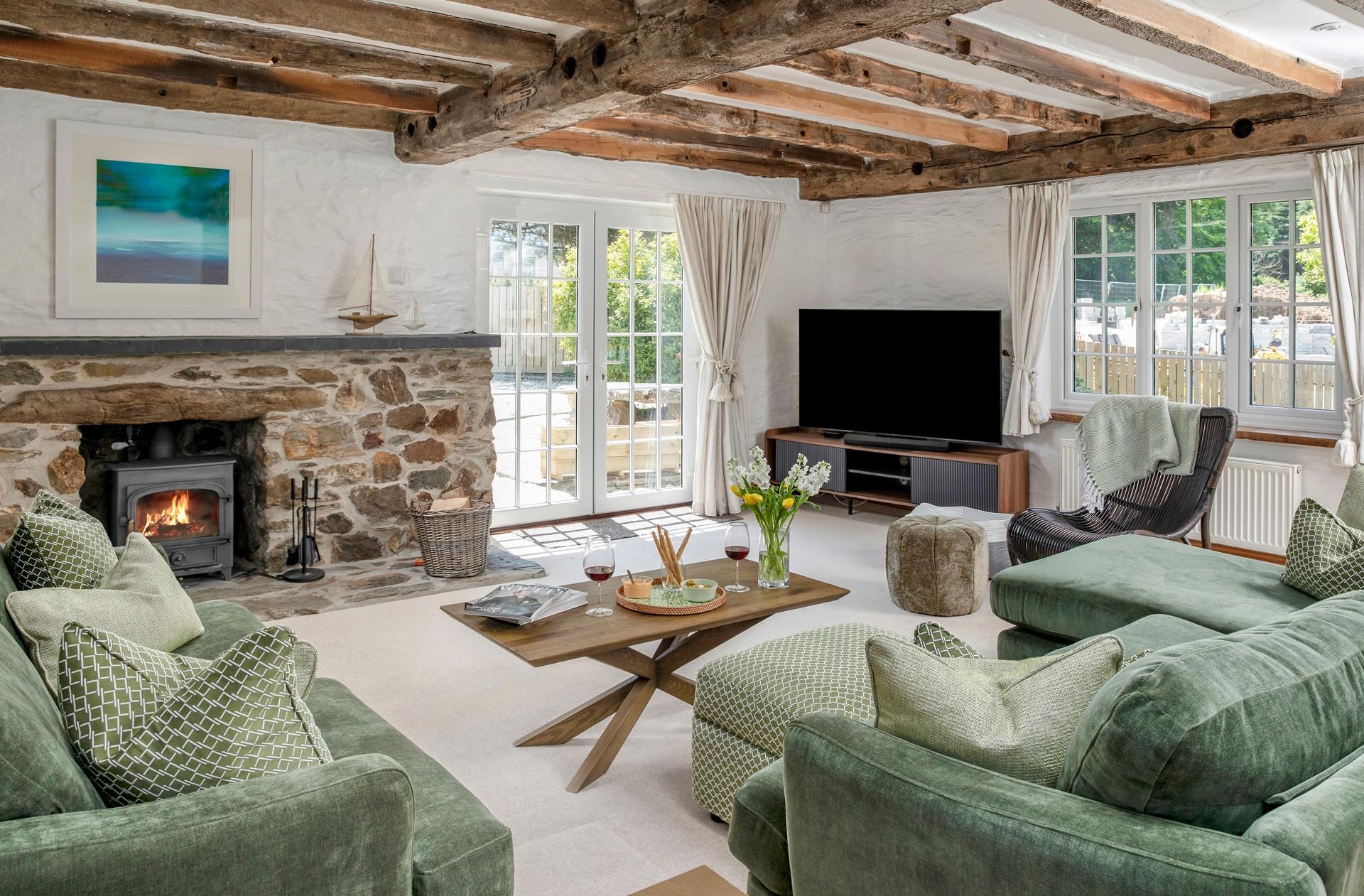 Sink into the plush sofas and put your feet up in front of the fire!