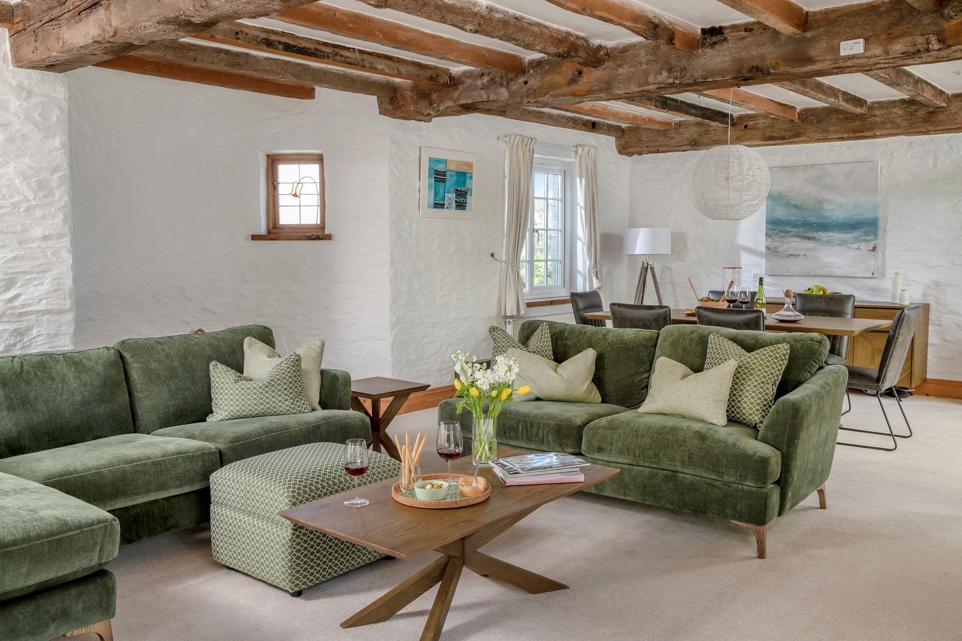 The sitting room is stylishly decorated whilst retaining its original charm.