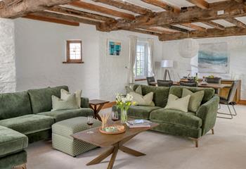 The sitting room is stylishly decorated whilst retaining its original charm.