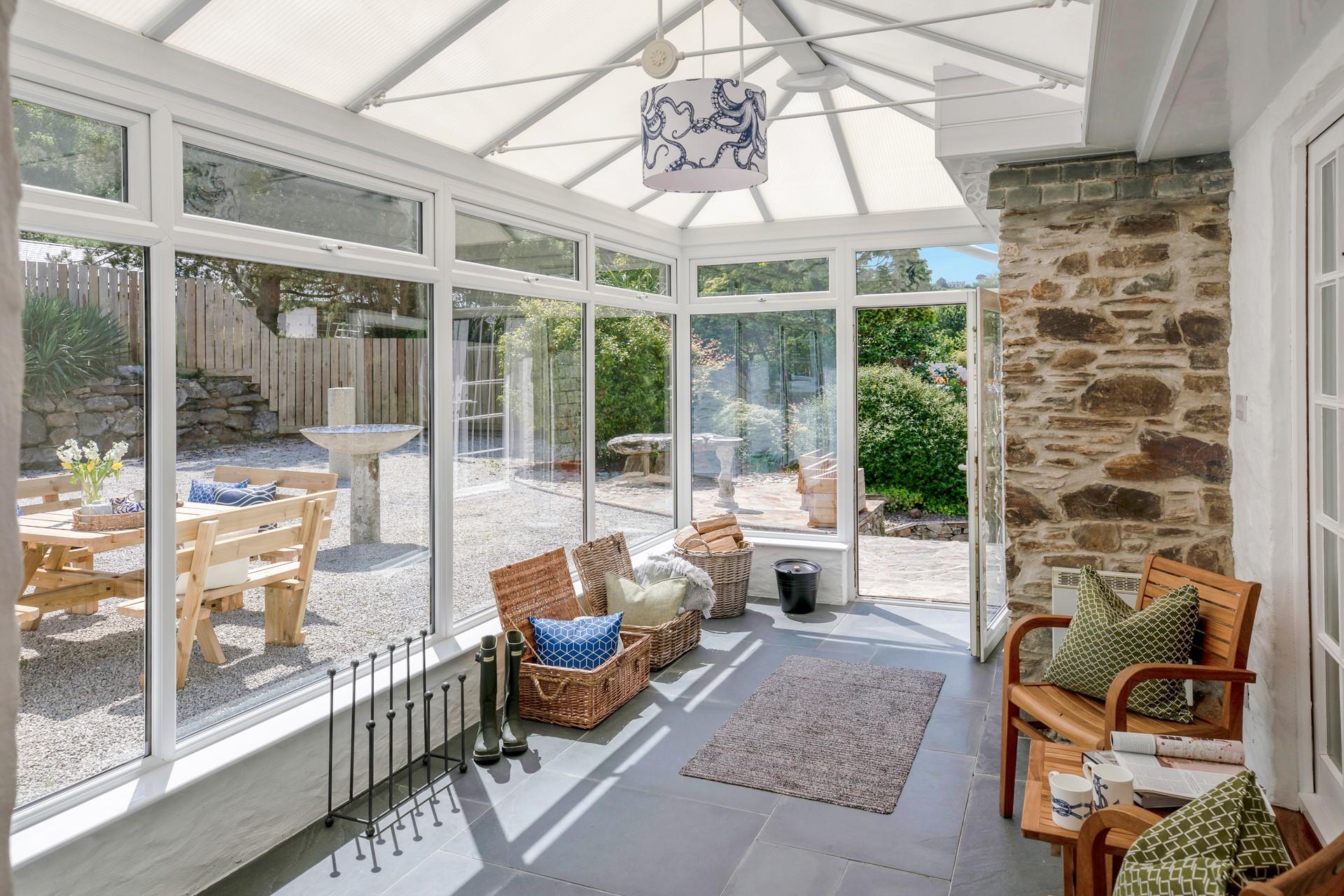 The conservatory is an additional space to relax.