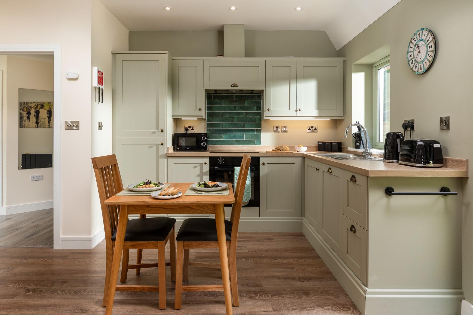 The compact kitchen has all the mod cons you need, including a dishwasher!