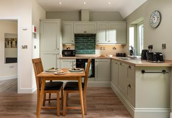 The compact kitchen has all the mod cons you need, including a dishwasher!