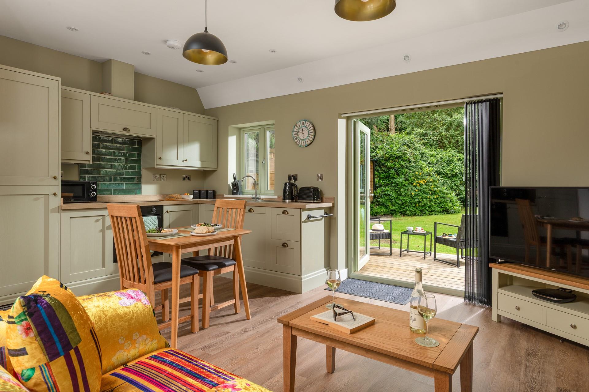 Calming sage green tones compliments the beautiful gardens.