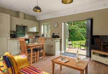 Calming sage green tones compliments the beautiful gardens.