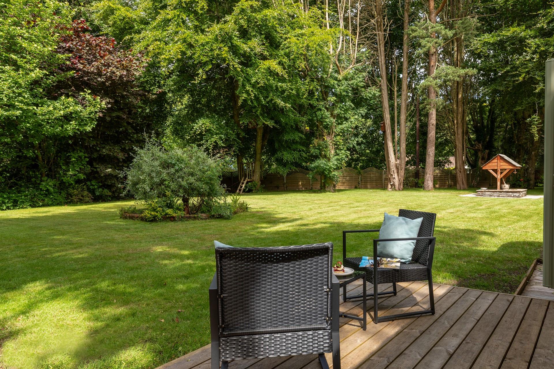 Set within the trees, with access to the coast path from the woodlands just a short walk away!