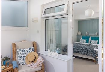 After a day on the beach, return to enjoy the garden and conservatory area.