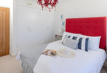 Drift off to sleep in the spacious bed.