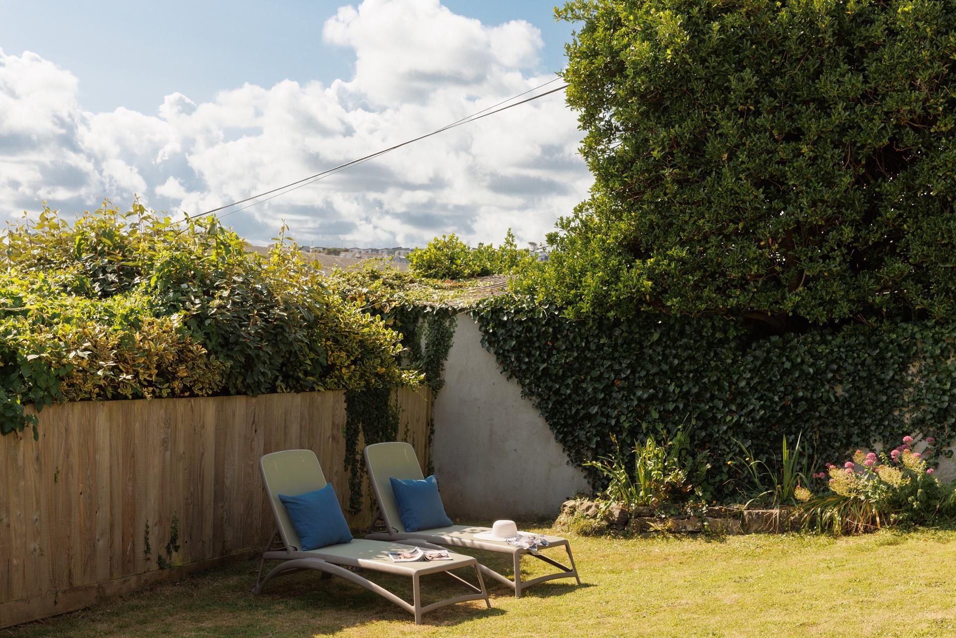 Relax and unwind on the loungers with a cold drink.