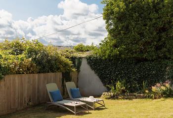 Relax and unwind on the loungers with a cold drink.