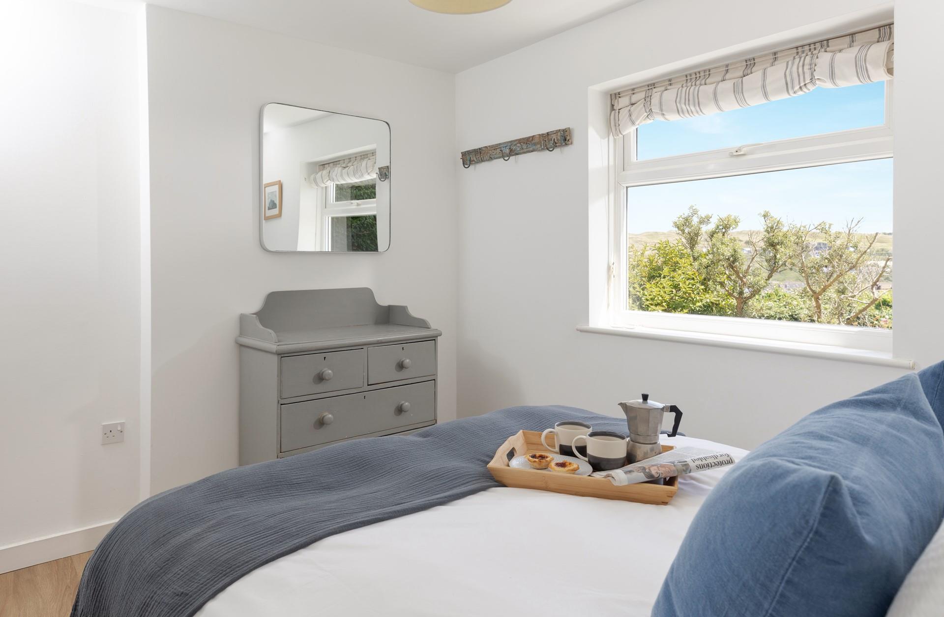 Wake up and check the day's weather before deciding on the day's plans.