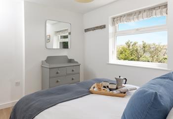 Wake up and check the day's weather before deciding on the day's plans.