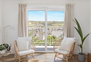 Sit in the window and enjoy the views of Perranporth beach.