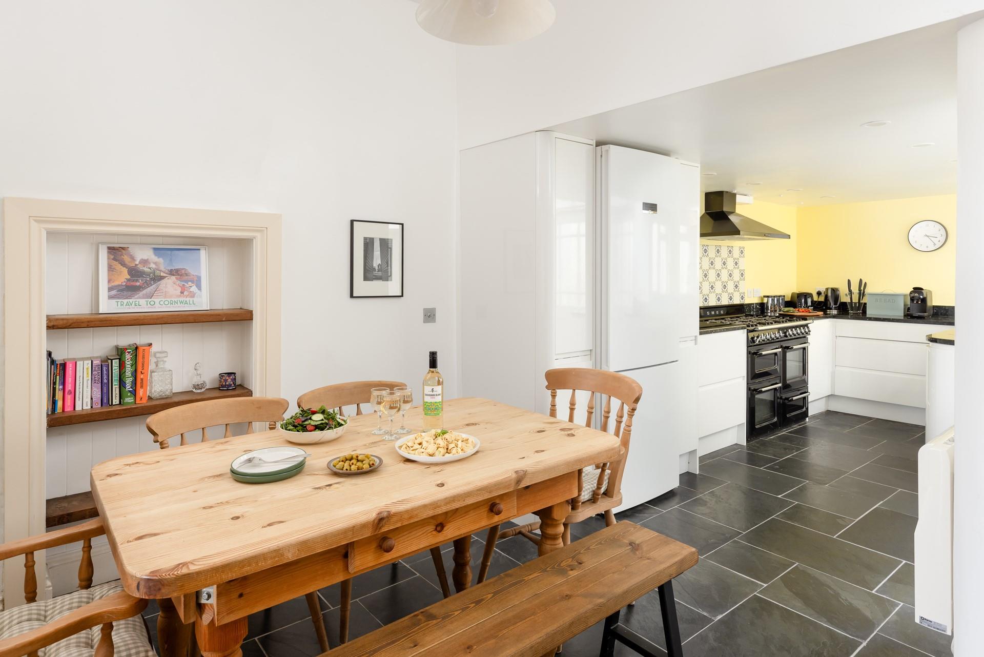 Cook and dine together after spending days exploring Cornwall.