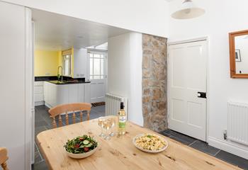 The dining area flows beautifully between the sitting room and kitchen.