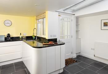 The contemporary kitchen has all the mod cons you need.