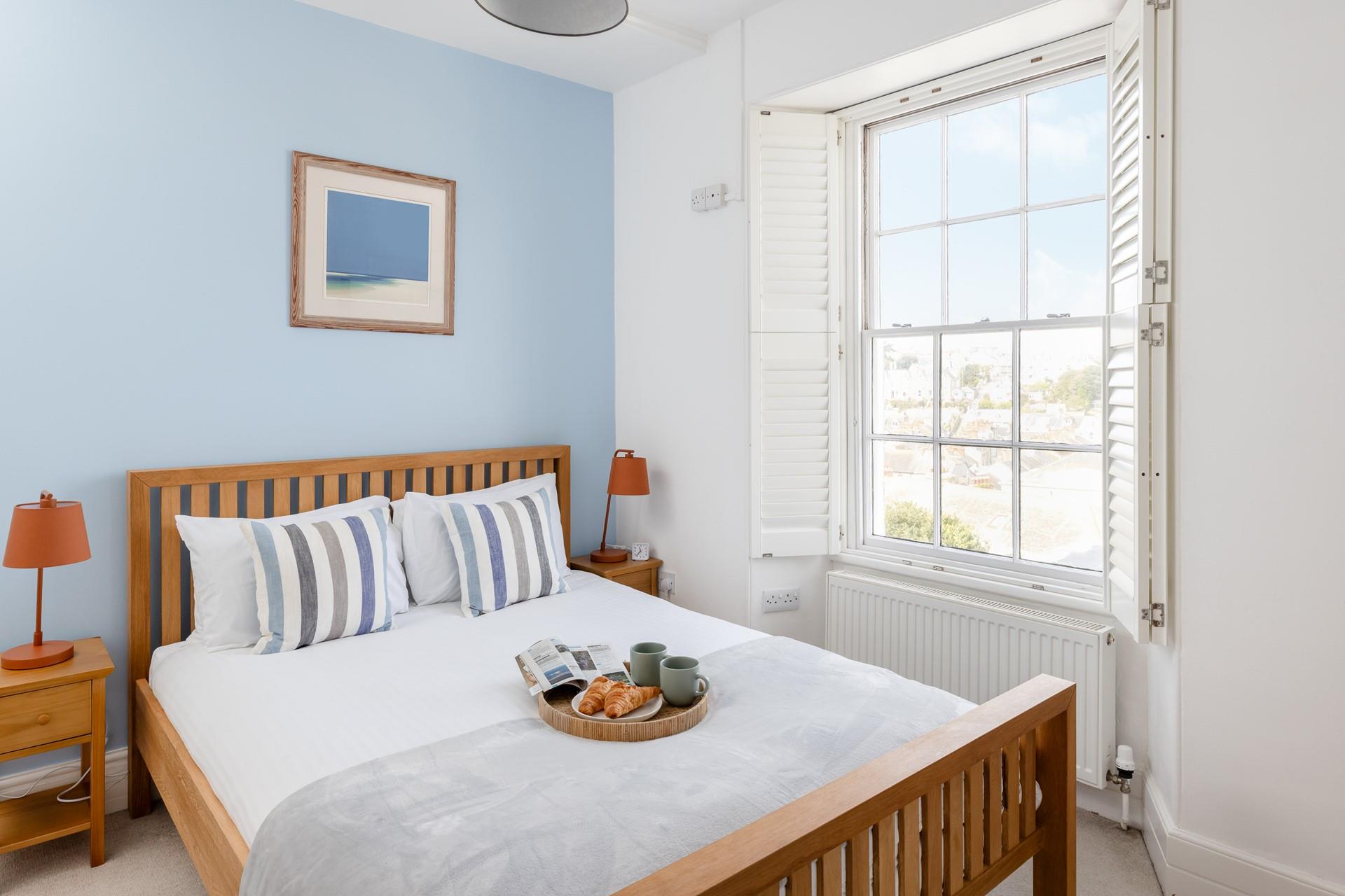 Bedroom 1 has far-reaching views across St Ives.