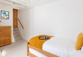 Steps down take you from bedroom 2 into the adjoining single.