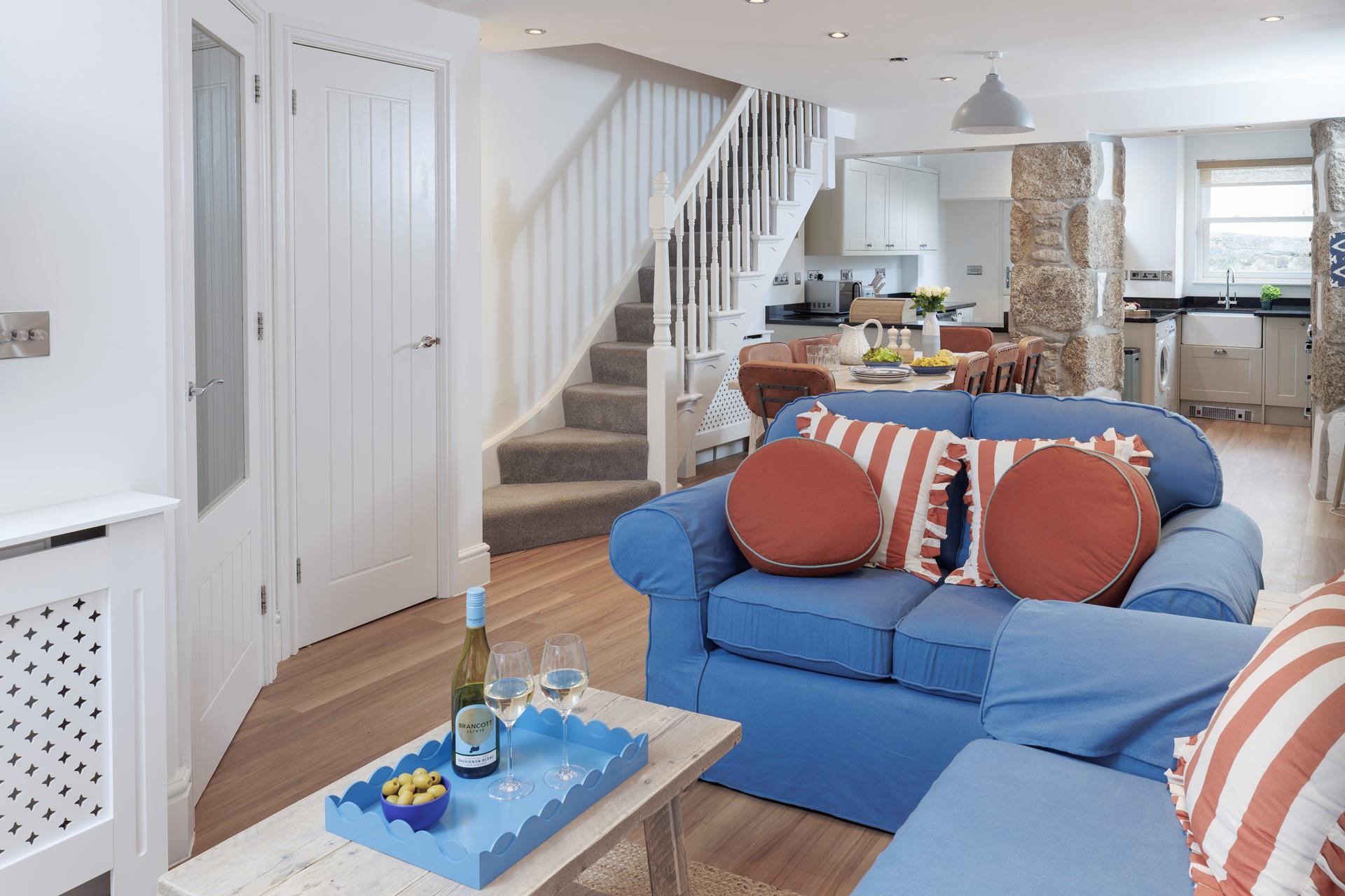 The open plan living space is the ideal cosy base to return to each day.