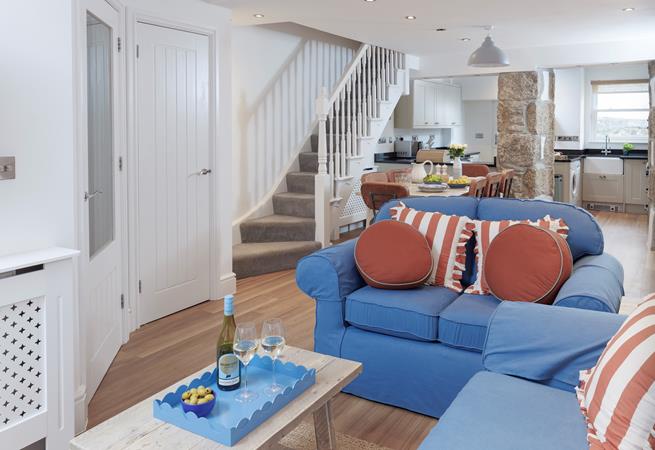 The open plan living space is the ideal cosy base to return to each day.