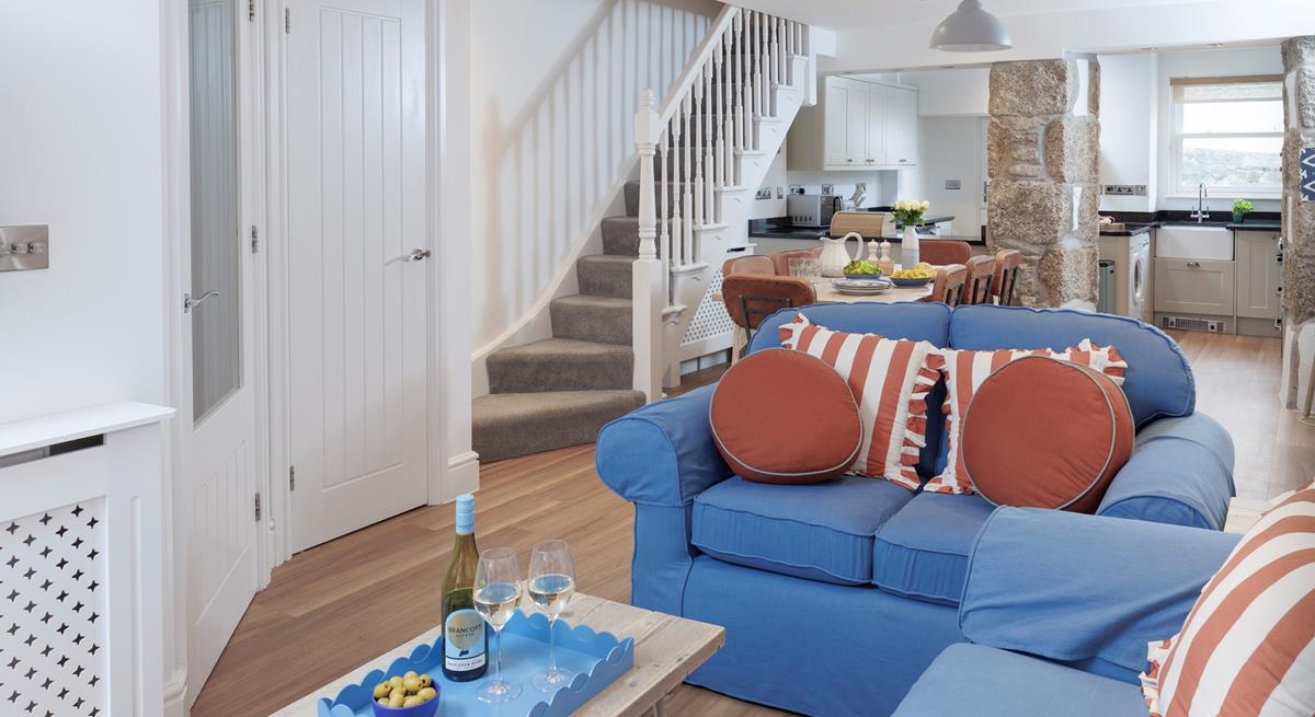 The open plan living space is the ideal cosy base to return to each day.