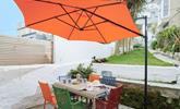 Take breakfast al fresco in the sunny garden. - Thumbnail Image