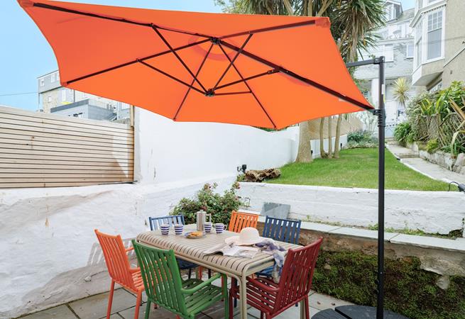 Take breakfast al fresco in the sunny garden.