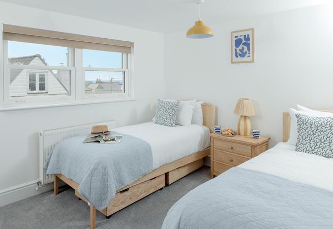 There are sea views over the rooftops from the twin room.