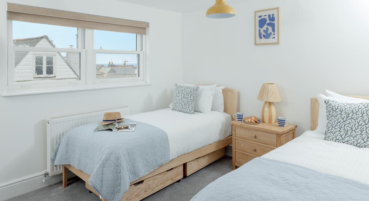 There are sea views over the rooftops from the twin room.