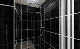 Wash the day away in the en suite shower room. - Thumbnail Image