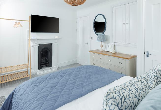 Enjoy a relaxing night's slumber in the soft sheets.