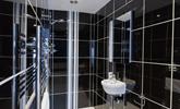 The en suite shower room is a great space to get ready each morning. - Thumbnail Image